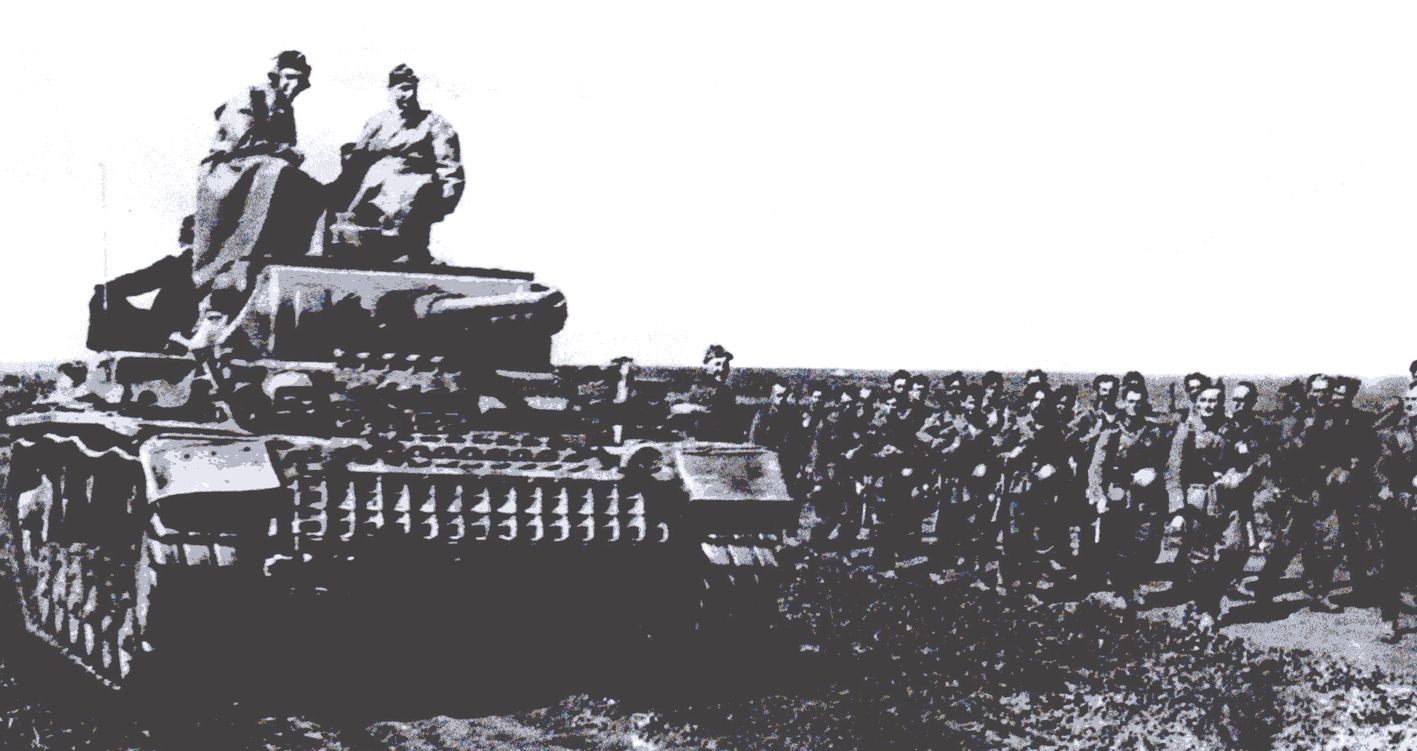 1942年夏天,德军第1和第4集团群向俄罗斯南部平原突进的一支部队。图中是一辆Ⅲ号J型坦克,装备了50毫米的 Kw.K L/60火炮;在车身前还安装了额外的履带防护。
